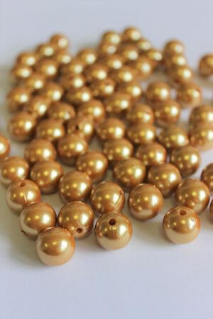 Zlaté ozdobné perly 14mm 72ks