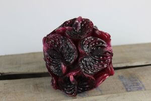 Lila gyertya flamingóvirágokból (anthurium)